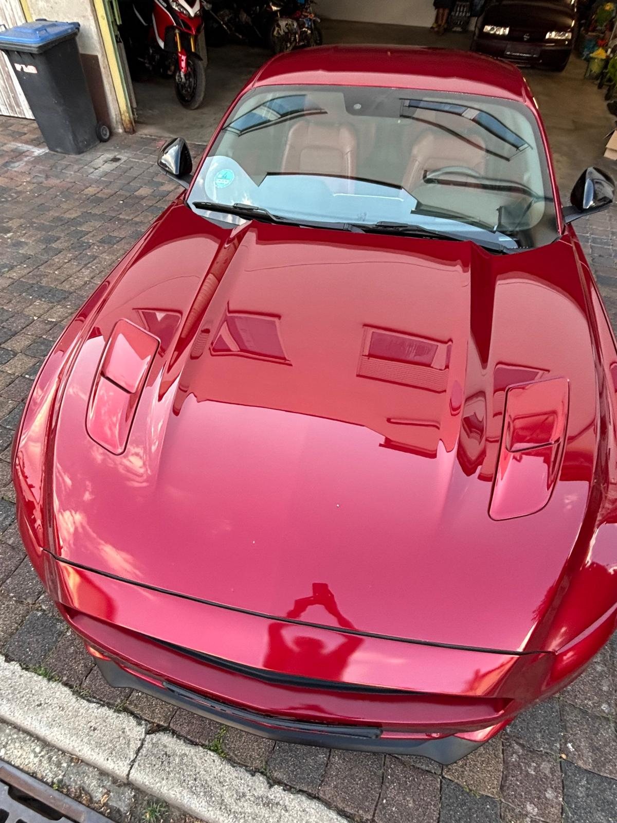 Ford Mustang GT rot mit glänzendem Lack nach Politur und Aufbereitung